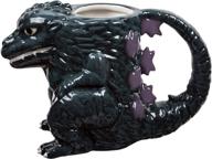 🦖 ceramic mug featuring godzilla sculpture logo