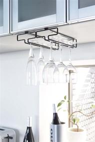 img 1 attached to 🍷 Yamazaki Home Stemware Shelf: Sleek Black Hanging Wine Glass Rack for Efficient Storage