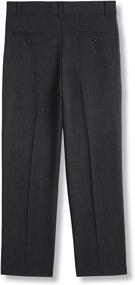 img 2 attached to 👖 Izod Bi Stretch Front Dress Black Boys' Pants: Stylish & Comfortable Clothing for Kids