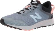 exceptional performance and style: new balance kid's fresh foam arishi v1 lace-up trail running shoe logo