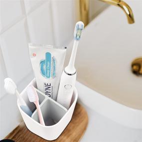 img 1 attached to 🚿 Convenient Bathroom Organizer: Toothbrush Holder with Anti-Slip Bottom, 3 Slots for Electric Toothbrush and Toothpaste, Detachable for Easy Cleaning