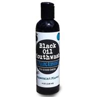 black oil mouthwash: sweet peppermint flavor, 4 🖤 oz, xylitol & activated charcoal blend for effective oil pulling logo