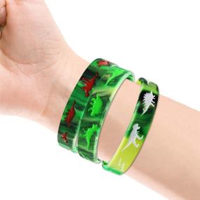 img 1 attached to 🦖 Dinosaurs Silicone Wristbands - Pack of 30, Dinosaurs World Jurassic Party Supplies for Dinosaur Themed Birthday Party - Favors, Gifts, Bags Stuffers in 3 Color Options