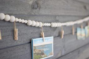 img 1 attached to 📷 Off-White Wood Bead Garland with Clothes Pin Photo/Card Holders - KALALOU CGL4037, One Size