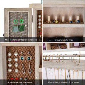 img 3 attached to 📿 X-cosrack Rustic Hanging Jewelry Organizer: Wall Mounted Mesh Holder with Removable Bracelet Rod, Hooks, and Wooden Barndoor Decor - Perfect for Necklaces, Earrings, Bracelets, and Rings