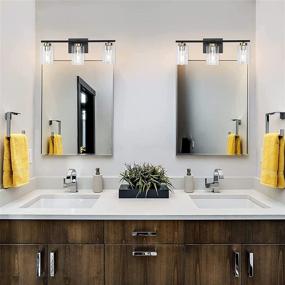 img 2 attached to 🛁 KOSTOMO 3-Light Sconces in Black and Brass Finish - Modern Bathroom Vanity Light Fixtures for Wall Lighting in Bedroom, Porch, Living Room, and Kitchen - Contemporary Design with Clear Glass Shade