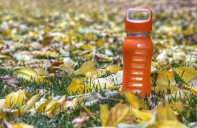 img 1 attached to EcoVessel SURF Sport Glass Water Bottle - 22 Ounces with Silicone Sleeve, Loop Top for added Protection