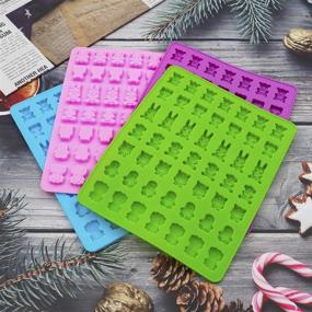 img 1 attached to 🍬 Универсальный набор из 4-х форм для желейных конфет из силикона - Создайте очаровательные шоколадки в форме медведя, льва, обезьяны, собаки, панды, совы и кролика - Включает 2 удобных пипетки.