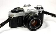 📸 vintage canon ae-1 program 35mm slr camera: exceptional 50mm 1:1.8 lens included logo