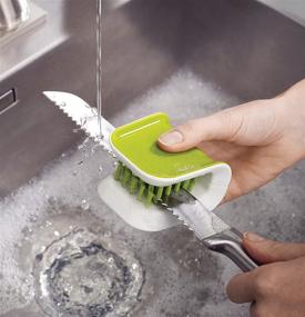 img 2 attached to Joseph Joseph BladeBrush Knife and Cutlery Cleaner | Bristle Scrub Kitchen Washing Brush | Non-Slip | One Size | Green