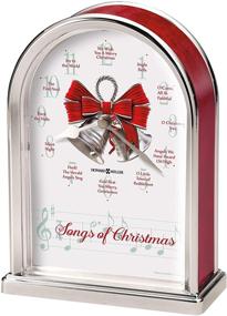 img 1 attached to 🎄 Howard Miller Songs of Christmas Table Clock 645-820: Festive Silver Arch with Red Marble Tone Sides, Decorative Silver Bells, Holiday Carol Chimes, Quartz Movement