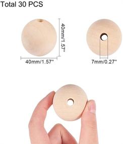 img 2 attached to 🔮 30PCS 40mm Natural Wooden Beads: Large Round Wood Ball for Jewelry Crafts, Home Decor, Macrame, Christmas Tree Farmhouse Garland DIY Projects - Unfinished Wooden Loose Spacer Bead by PH PandaHall