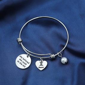 img 1 attached to 🎁 Eigso Custom Engraved Keychain Bracelet for Hairdressers, Gardeners, Tailors, Accountants, Bartenders, and Book Lovers – Show Appreciation with 'She Believed She Could' Gift