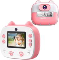 📸 dragon touch instantfun2 kids camera with dual camera lens, print paper, cartoon sticker, color pens, and camera bag - perfect for girls and boys (pink) logo