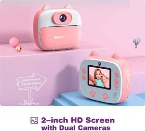 img 3 attached to 📸 Dragon Touch InstantFun2 Kids Camera with Dual Camera Lens, Print Paper, Cartoon Sticker, Color Pens, and Camera Bag - Perfect for Girls and Boys (Pink)