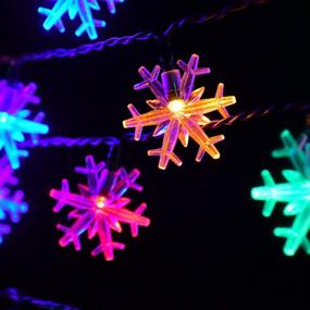 img 1 attached to 🌲 Huacenmy Outdoor Solar Snowflake Christmas Lights: Multicolor 50 LED 8 Modes Fairy String Lights for Tree, Roof, Window, Backyard, Porch, and Party Decor