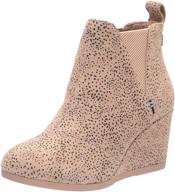 👢 stylish and comfortable: toms women's kelsey wedge chelsea bootie for ultimate style and support logo