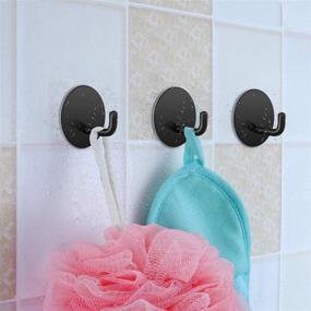 img 2 attached to 💪 SouLips Strong Adhesive Hooks, Black Wall Mount Hanger for Keys Coats Towels - Heavy Duty Stainless Steel Hooks for Kitchen Bathroom Toilet - No Drill, Waterproof, 4 Pack