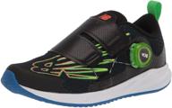 ultimate comfort and speed: new balance kid's fuelcore reveal v3 boa running shoe logo