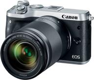 silver canon eos m6 camera kit with 18-150mm f/3.5-6.3 is stm lens logo