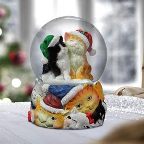 img 1 attached to 🎶 Музыкальное снежное шарике: Рождественские коты от компании "San Francisco Music Box Company".