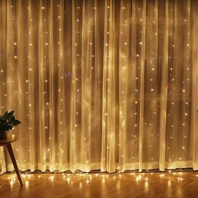 img 4 attached to 300 LED Twinkle Star Window Curtain String Lights - Warm White Christmas Wedding Party Home Garden Bedroom Outdoor Indoor Wall Decorations