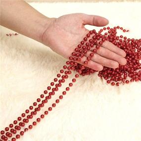 img 1 attached to 🎄 SANNO 33ft Christmas Tree Beads: Artificial Pearls Garland Roll with Plastic Beads for Xmas Tree DIY Supplies and Holiday Decorations - Red