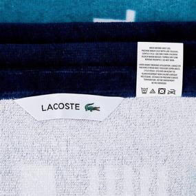 img 2 attached to Lacoste Oki Beach Towel, 🏖️ 100% Cotton, 36x72 inches, Teal/Blue Iconic Design