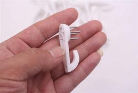 img 2 attached to 20PCS Powerful White Concrete Wall Hooks: Non-Trace Hanging for Picture Frames, Clocks, and More (5cm Length)