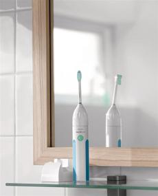 img 1 attached to 🦷 Efficient Dental Care: Philips Sonicare HX5611/01 Essence Rechargeable Electric Toothbrush in Mid-Blue