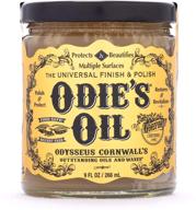 🔍 discover odie's oil - the ultimate universal solution in a 9oz jar logo