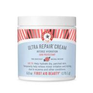 vegan and gluten-free ultra repair cream by first aid beauty: intense moisturizer for dry and sensitive skin, ideal for skin conditions and eczema. scented with pink grapefruit (14 ounce) logo