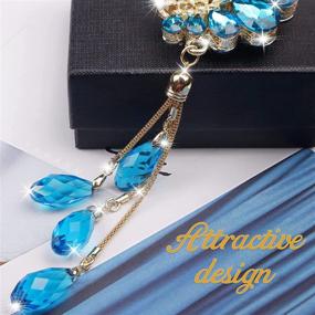 img 1 attached to 💎 Sparkling Blue Diamond Swan Crystal Rear View Mirror Charms | Bling Car Hanging Accessories for Women & Men | Rhinestones Sun Catcher Lucky Ornament Chain | Car Chandelier Pendant | Bling Car Décor (Blue)