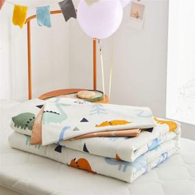 img 1 attached to 🦖 Joyreap 4 Piece Cotton Toddler Bedding Set for Kids Boys and Girls - Dinosaur Theme, Cream White and Orange, Reversible Design - Includes Quilted Comforter, Fitted Sheet, Top Sheet, and Pillowcase