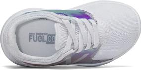 img 2 attached to 👟 FuelCore Coast V3 Running Shoe by New Balance - Unisex Child Option