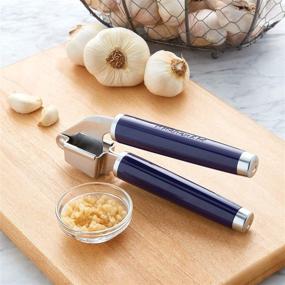 img 1 attached to KitchenAid Classic Garlic Press, 7.68-Inch, in Cobalt Blue