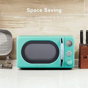 img 1 attached to 🍏 Galanz GLCMKA07GNR-07 Surf Green Retro Microwave Oven with LED Lighting, Pull Handle Design, Child Lock, and 0.7 cu ft Capacity