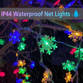 img 1 attached to 🎄 Multicolor 100 LED Christmas Snowflake Lights: Waterproof Xmas Decorations for Indoor Use - 32ft Fairy String Lights with 8 Modes