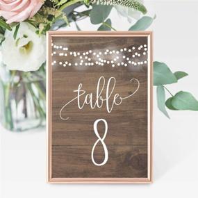 img 1 attached to Rustic Wood Lights Table Number Signs for Wedding Reception & Events - Double Sided, Calligraphy Printed, Reusable Frame Stand - 1-25 Numbered Cards, 4x6 Size