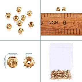 img 1 attached to 📿 Craftdady 100pcs 18K Gold Corrugated Round Spacer Beads 5mm - Tiny Brass Rondelle Ball Loose Beads for Jewelry Making - 1.5-2mm Hole Size