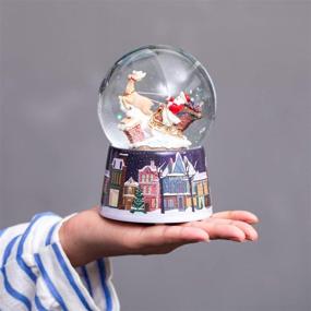 img 1 attached to 🎅 Christmas Santa Claus is Coming to Town Snow Globe with Reindeer and Sleigh - Musical Snowglobe