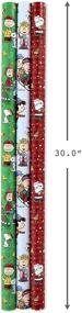 img 2 attached to Hallmark Christmas Peanuts Wrapping Paper Pack - Snoopy, Charlie Brown, Woodstock, 3 rolls (105 sq. ft. total) - With Reverse Cut Lines