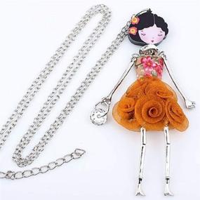 img 1 attached to 🧡 Fabric Dress Pendant French Doll Necklace with Enamel - Various Designs (Orange Dress)