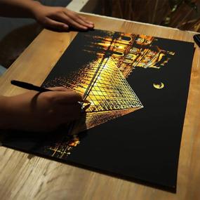 img 2 attached to 🎨 Vibrant Rainbow Scratch Paper: Art Craft Night View Scratchboard for Adults and Kids - Creative Gift Set (16” x 11.2”) - 4 Pack with 8 Tools, Including Paris, Louvre, New York, and Canada Designs