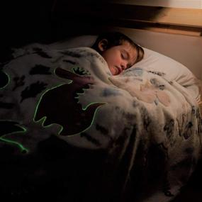 img 1 attached to 🦖 Urban SouQ Glow in The Dark Dinosaur Blanket for Boys and Girls - Soft Fleece Throw for Kids. Magic Glowing Bed Comforter, Travel Stroller Blanket for Baby Toddler.