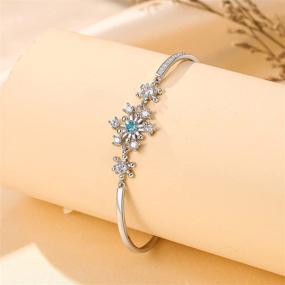 img 2 attached to ❄️ Shimmering Snowflake Bracelet: Exquisite Christmas Gift with Sparkling Cubic Zirconia for Women and Girls