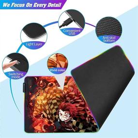 img 1 attached to 🐇 Vibrant RGB Anime Mouse Pad featuring Demon Slayer Tanjiro and Nezuko - Extra Large Size for Perfect Gaming Setup, with Stitched Edge Frame & Non-Slip Rubber Base - Glowing Desk Pad for Laptop, Keyboard, and Mice - 31.5X11.8 inches