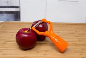 img 1 attached to 🍊 Boston Warehouse Monkey Vegetable Peeler Review: A Closer Look at the Orange Peeler Design