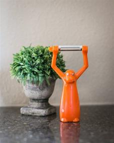 img 3 attached to 🍊 Boston Warehouse Monkey Vegetable Peeler Review: A Closer Look at the Orange Peeler Design