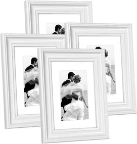img 4 attached to Hap Tim 5x7 Picture Frame: Elegant White Wooden Frames for Tabletop & Wall Decor, Set of 4 (CWH-5x7-WT)
